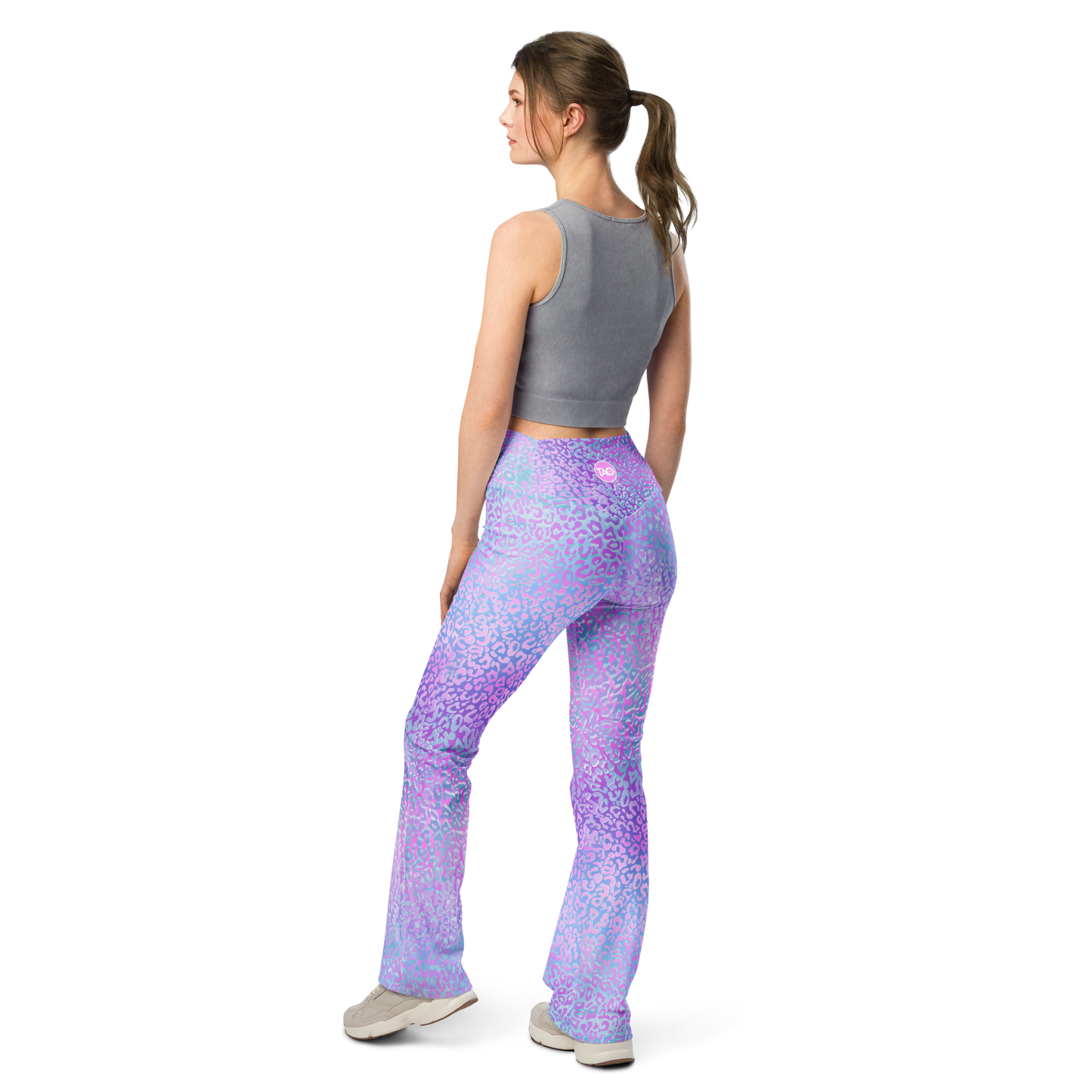 Model wearing Leopardy Purple flared leggings with bold leopard print and high waistband – TAO Infinity