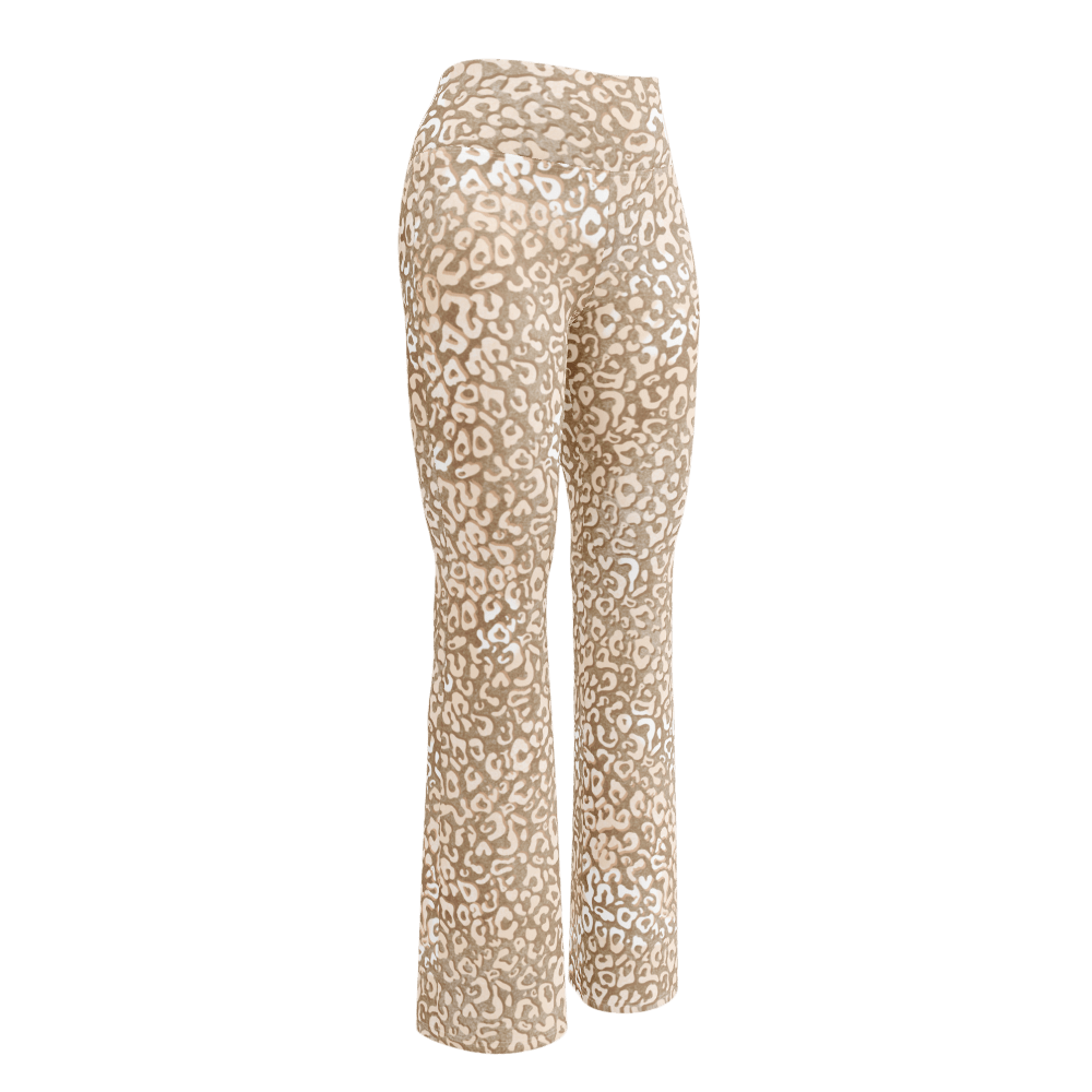 Woman wearing high-waisted leopard print flare leggings with a butt-lifting cut and double waistband, made from recycled fabric with UPF 50+ protection — bold, sculpting, and sustainably made for confident movement.
