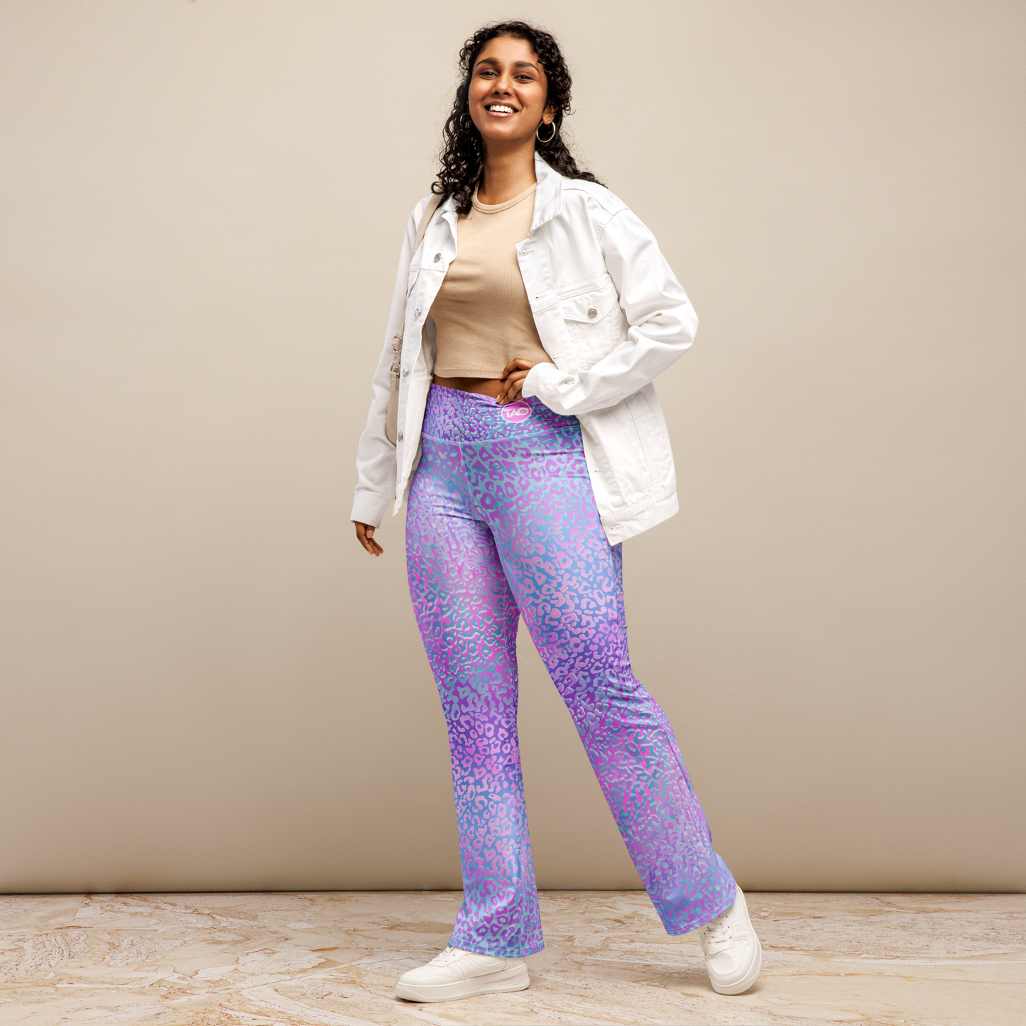 Model wearing Leopardy Purple flared leggings with bold leopard print and high waistband – TAO Infinity