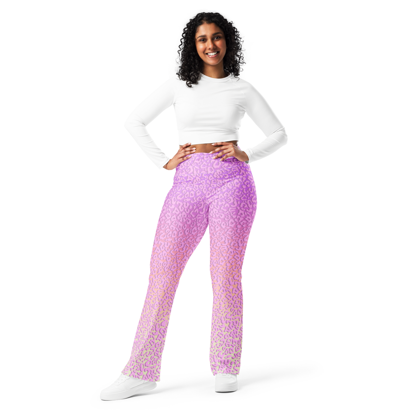 Model wearing Pinky Leo flared leggings with pink leopard print and sculpted high-waist fit – TAO Infinity