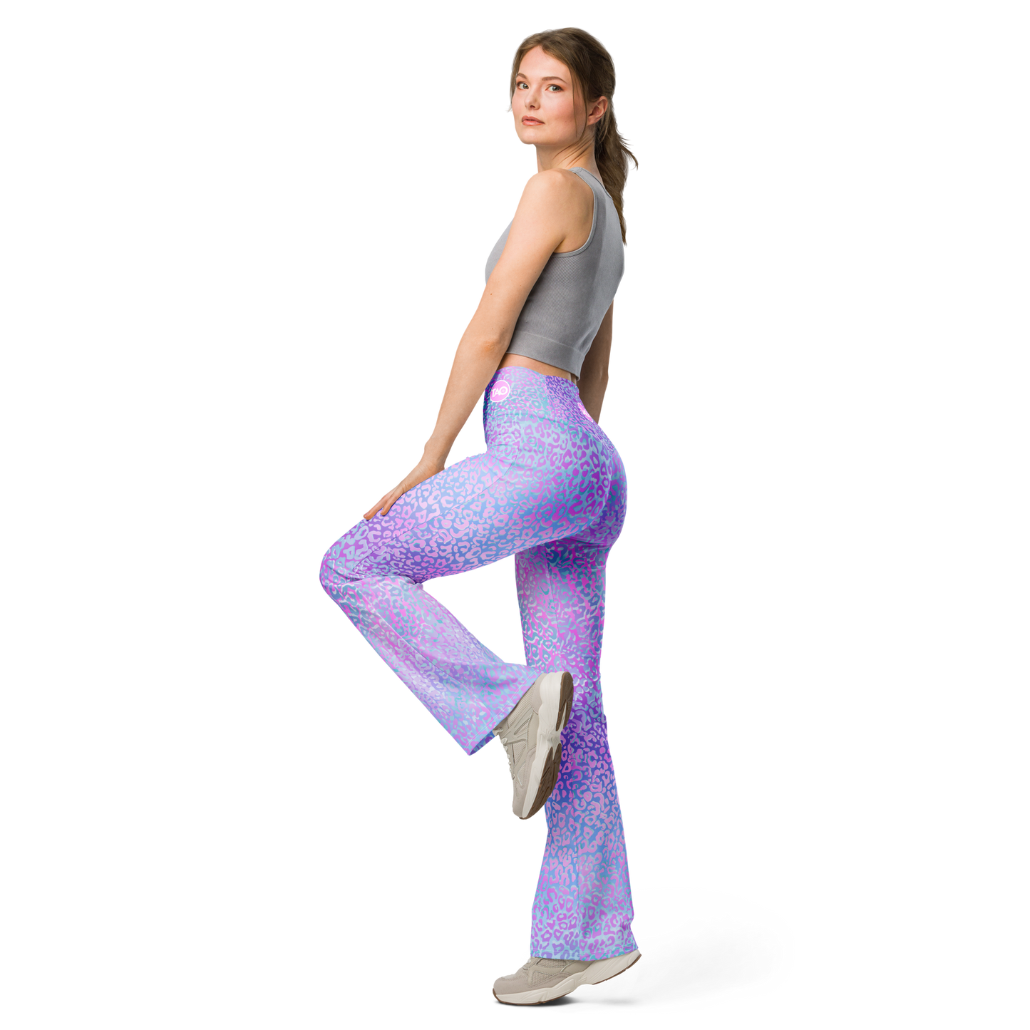 Model wearing Leopardy Purple flared leggings with bold leopard print and high waistband – TAO Infinity