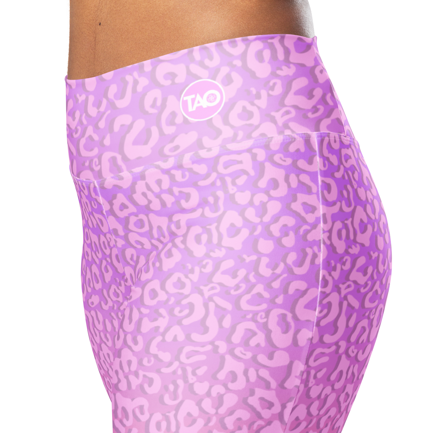 Model wearing Pinky Leo flared leggings with pink leopard print and sculpted high-waist fit – TAO Infinity