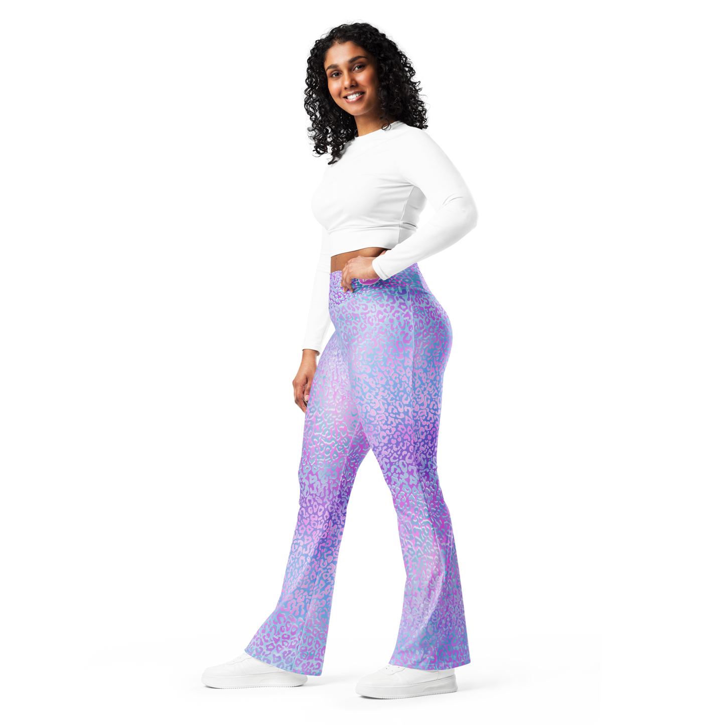 Model wearing Leopardy Purple flared leggings with bold leopard print and high waistband – TAO Infinity