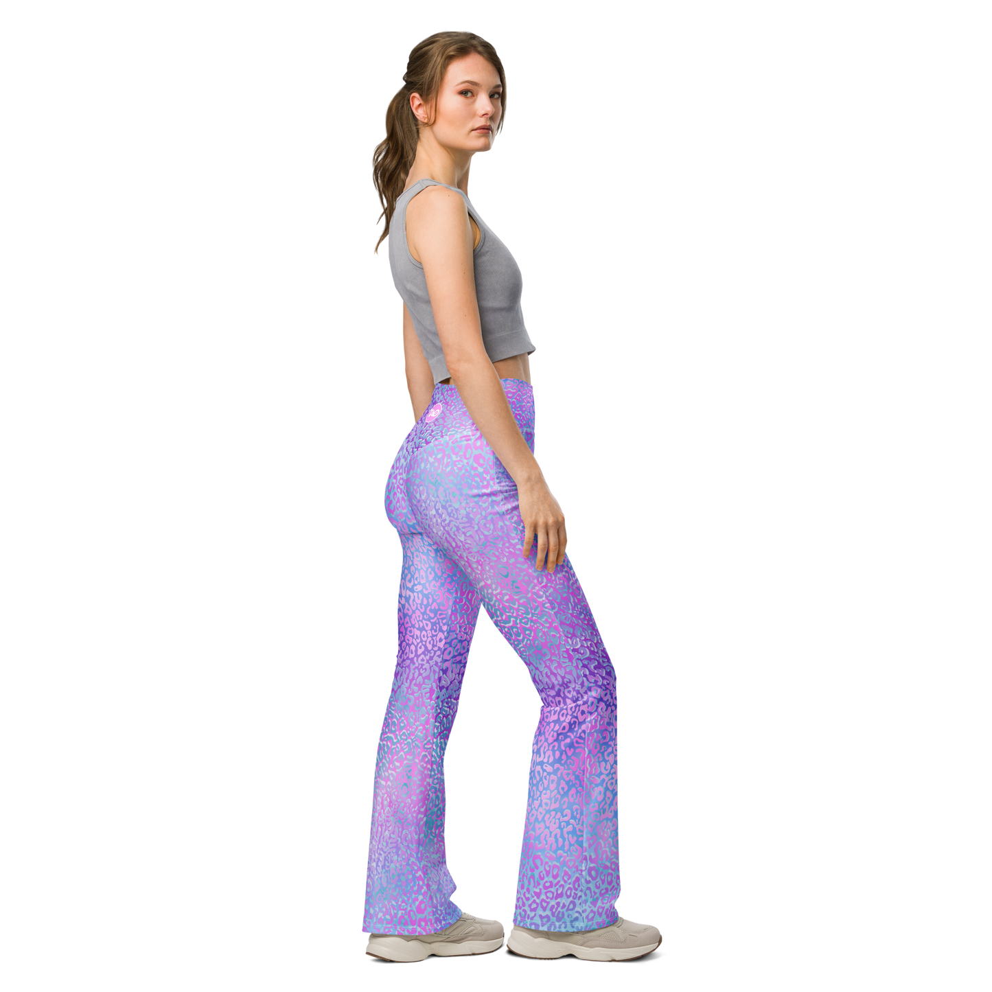 Model wearing Leopardy Purple flared leggings with bold leopard print and high waistband – TAO Infinity