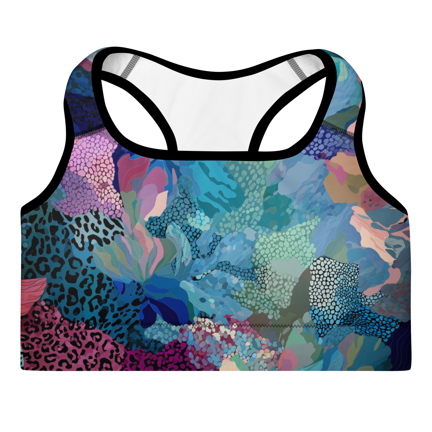 Woman wearing a blue camo-print sports bra with scoop neckline, racerback, and wide underband — made from moisture-wicking, four-way stretch fabric with removable padding for active support and bold style.