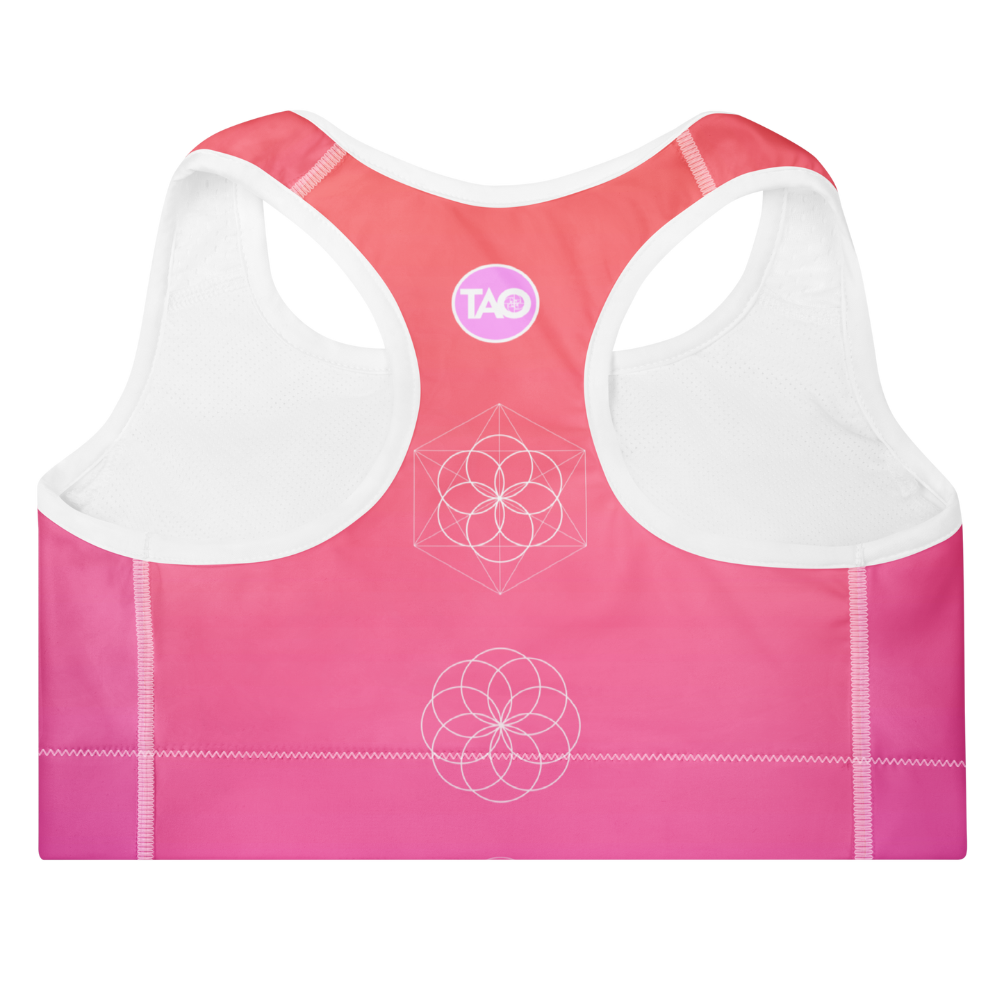 Woman wearing a blush-toned floral sports bra with scoop neckline, racerback, removable padding, and wide elastic underband — designed for medium support, comfort, and movement with a feminine flair.