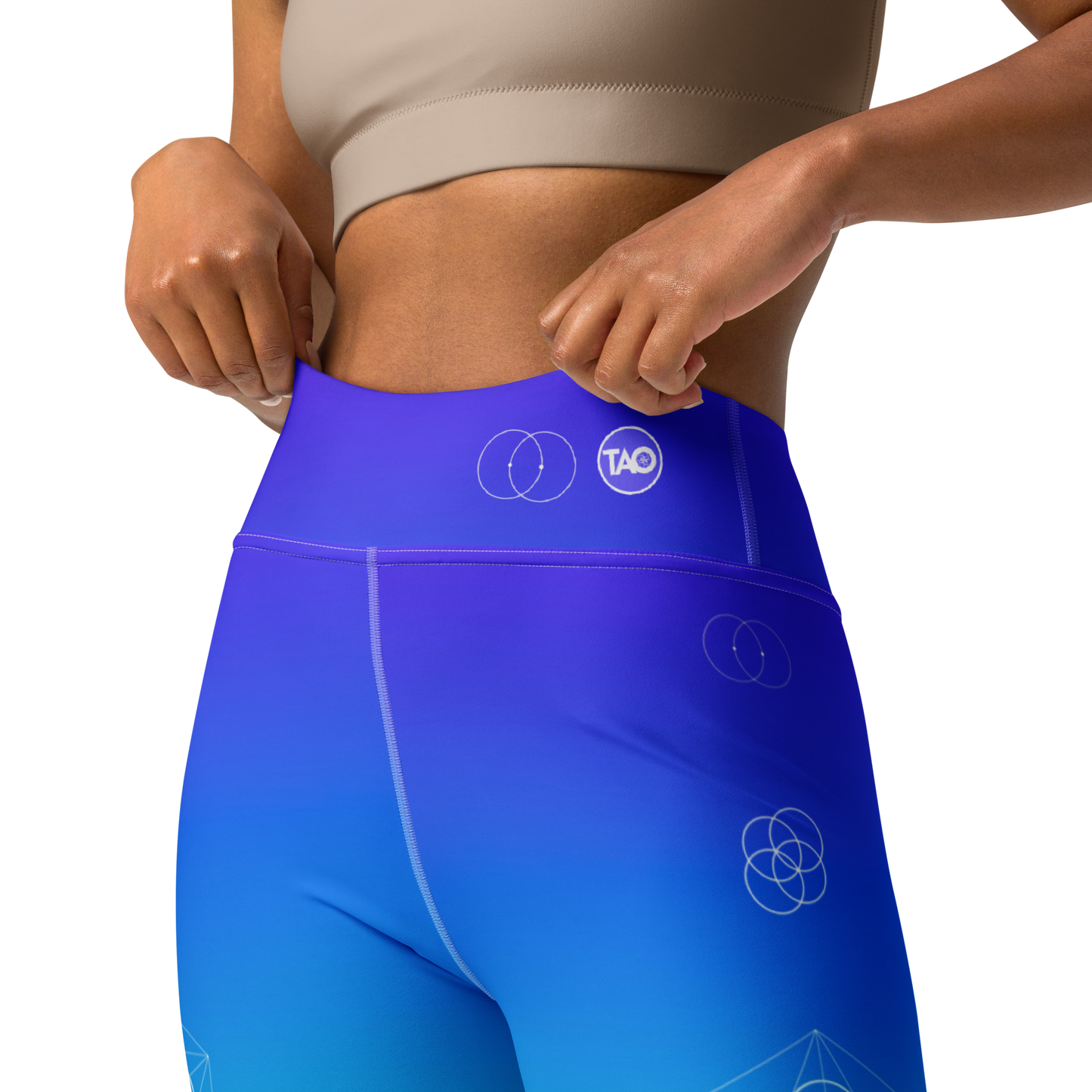 Model wearing Aqua Flower full-length yoga leggings with ocean gradient and sacred Flower of Life print – TAO Infinity