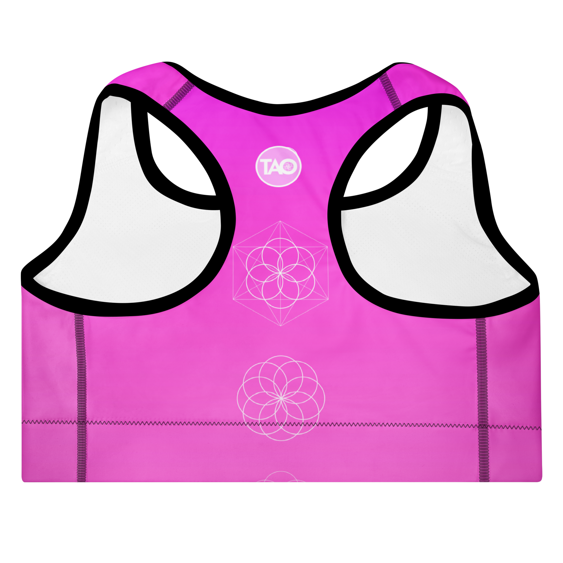 Woman wearing a soft pink sports bra with scoop neckline, racerback, wide elastic band, and removable padding — designed for flexibility, comfort, and feminine performance.
