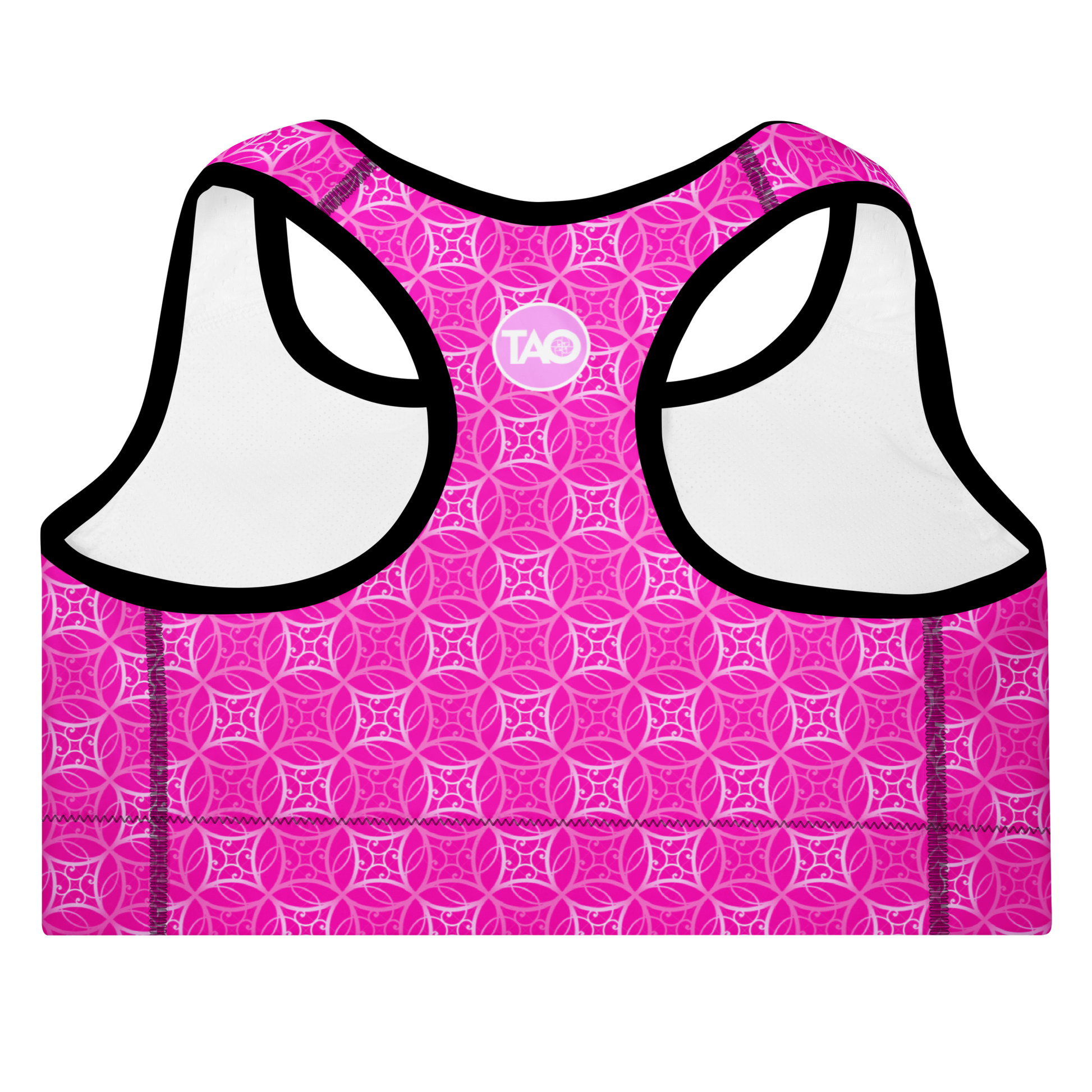 Model wearing Fibbo Pinky Sports Bra with pink sacred geometry design, featuring scoop neckline, racerback, and wide elastic band for support.