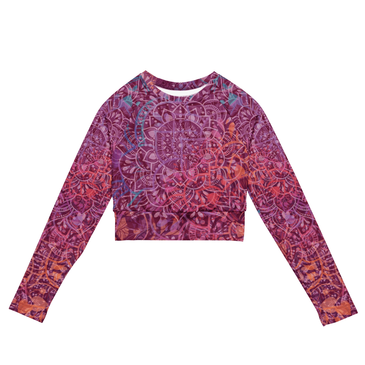 Woman wearing a vibrant mandala-patterned long-sleeve crop top