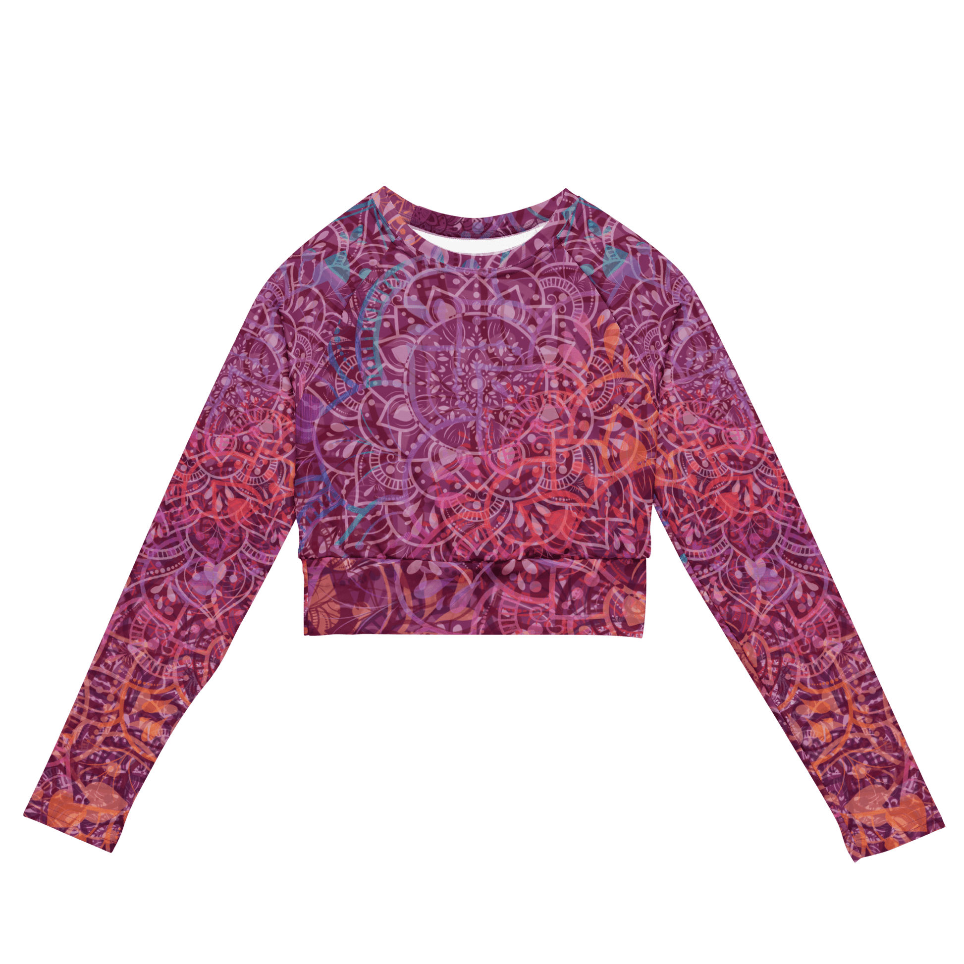 Woman wearing a vibrant mandala-patterned long-sleeve crop top