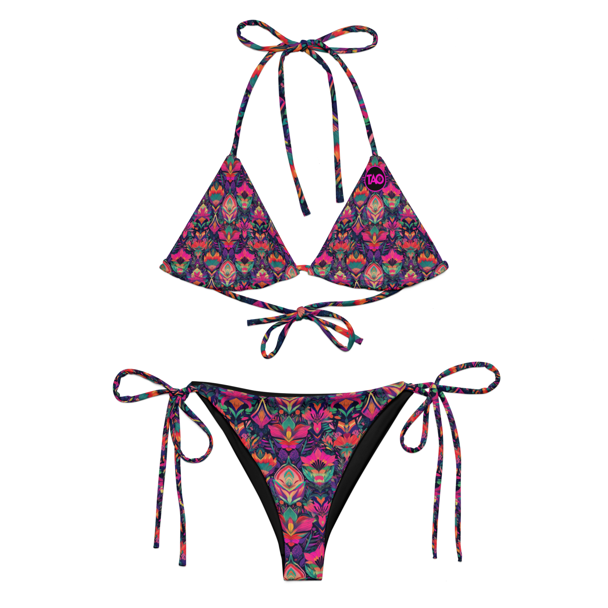 Woman wearing a vibrant jungle-patterned string bikini with sacred geometry detailing, featuring adjustable triangle top and side-tie bottoms, set against a tropical background — bold, eco-conscious, and limited edition.