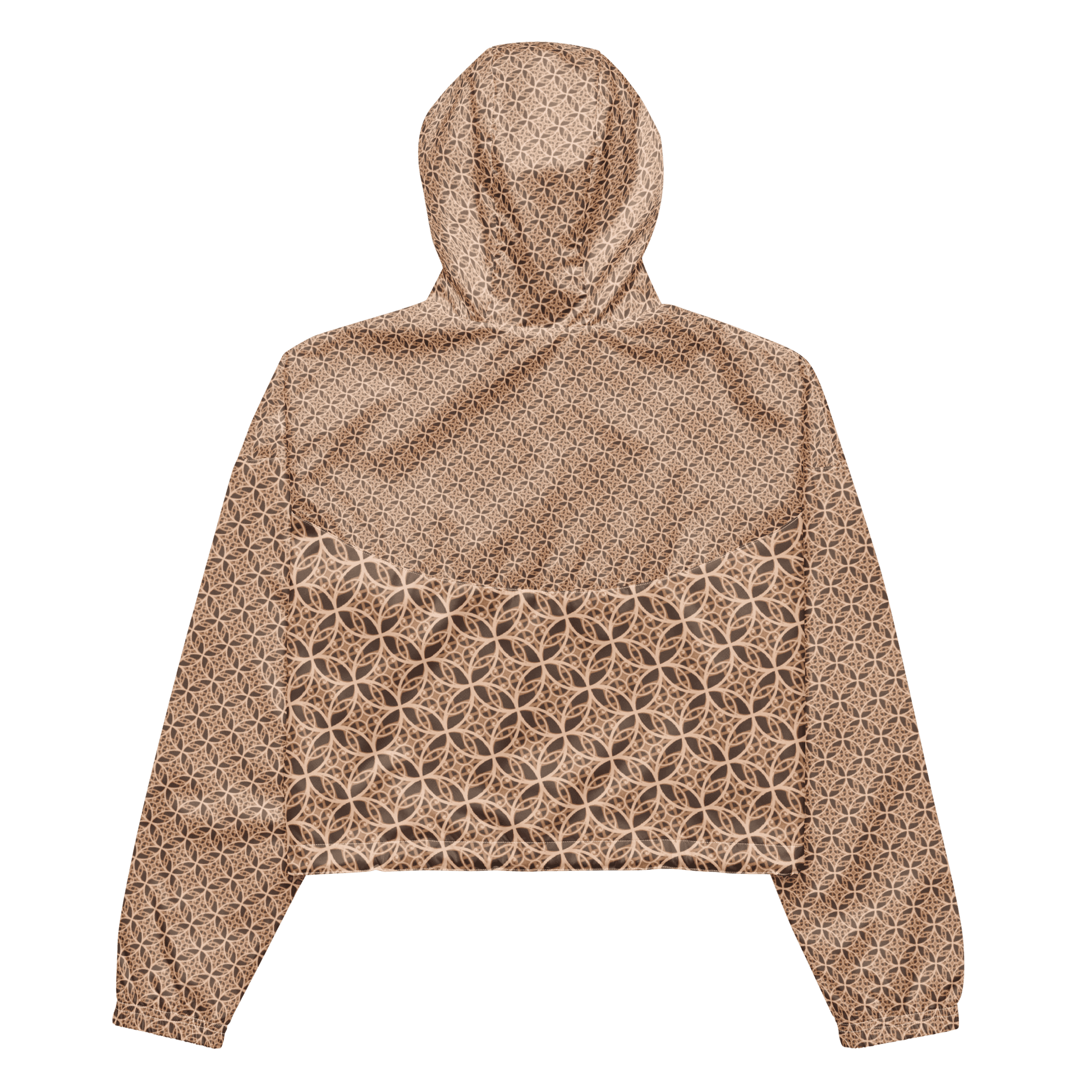 Woman wearing a lightweight beige cropped windbreaker with monogram Fibonacci pattern, featuring adjustable drawcords, side-slit pockets, and mesh lining — a waterproof, sacred-geometry inspired layer for mindful movement and conscious living.