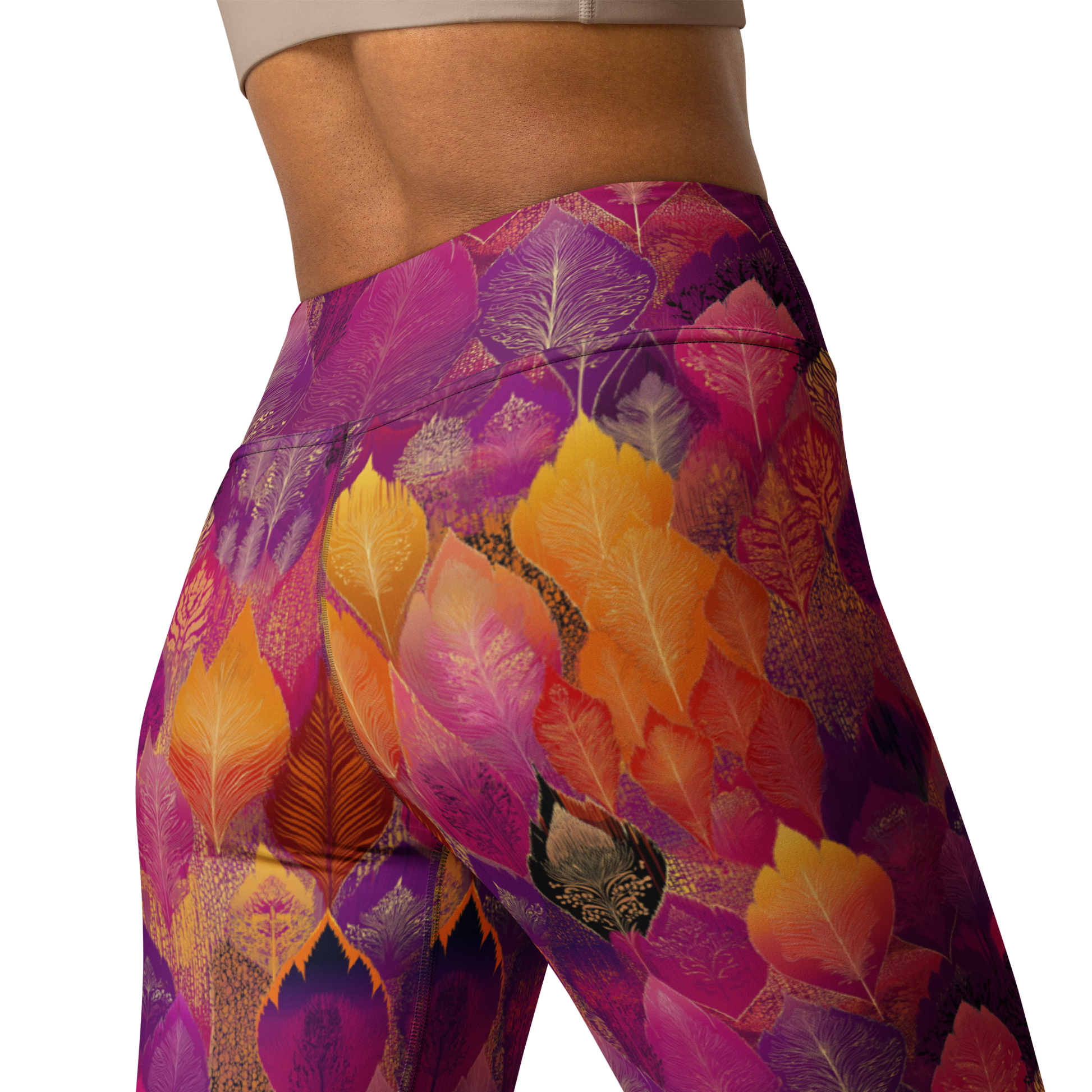 Woman wearing high-waisted yoga leggings in a bold, spice-toned Southeast Asian-inspired print, made from soft microfiber fabric with four-way stretch and a body-hugging fit.