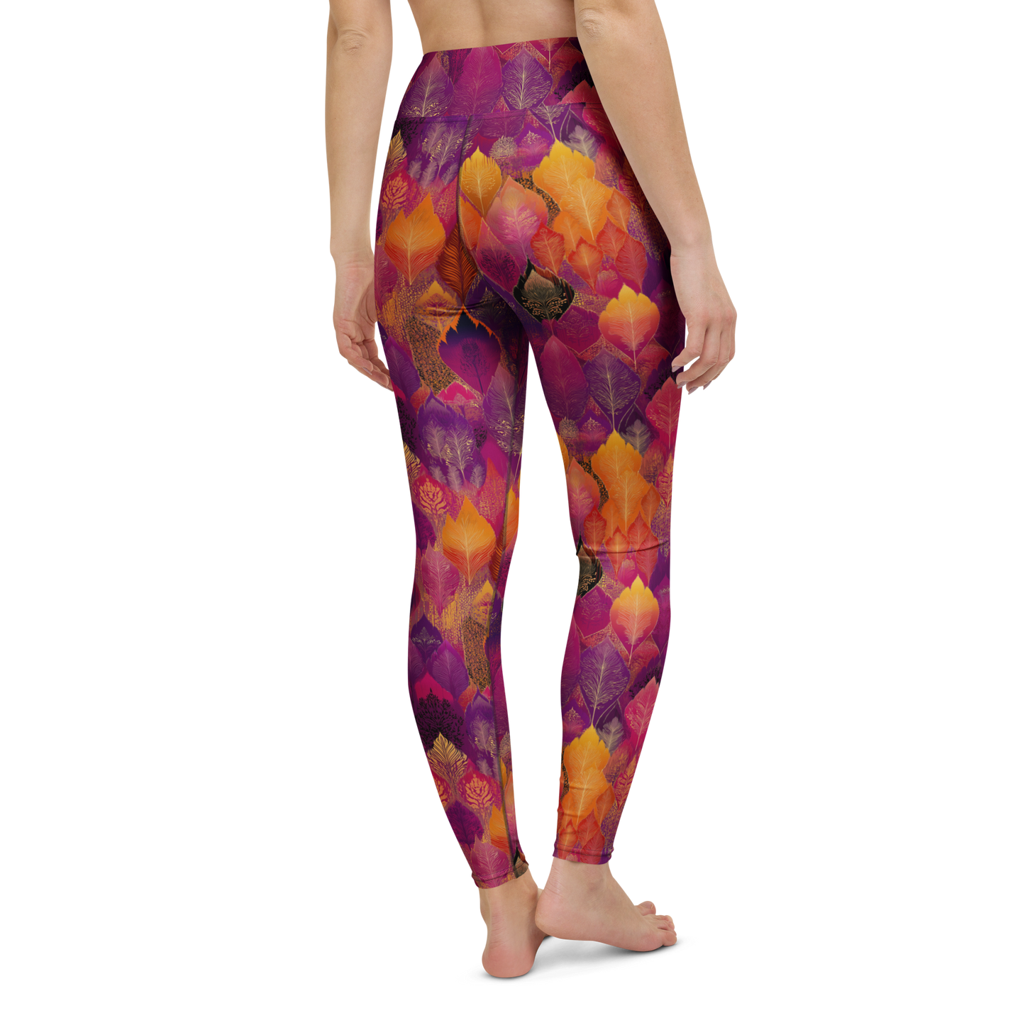 Woman wearing high-waisted yoga leggings in a bold, spice-toned Southeast Asian-inspired print, made from soft microfiber fabric with four-way stretch and a body-hugging fit.