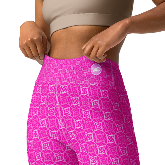 Model wearing Fibbo Pinky Yoga Leggings featuring soft pink sacred geometry design with high waistband, made from stretchy eco-conscious fabric.