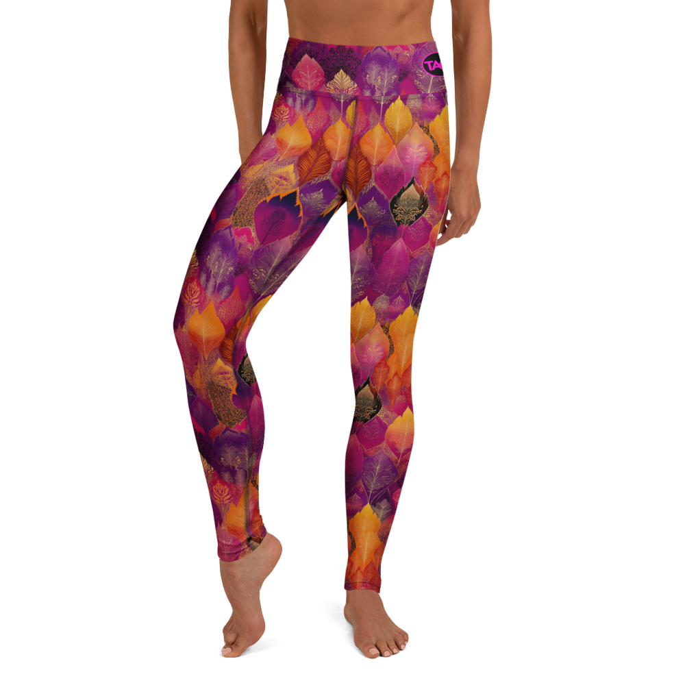 Woman wearing high-waisted yoga leggings in a bold, spice-toned Southeast Asian-inspired print, made from soft microfiber fabric with four-way stretch and a body-hugging fit.