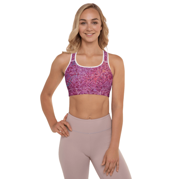 Mandala Glow Sports Bra featuring a vibrant mandala-inspired design in warm cherry hues, with a racerback style and moisture-wicking fabric, perfect for yoga and workouts.